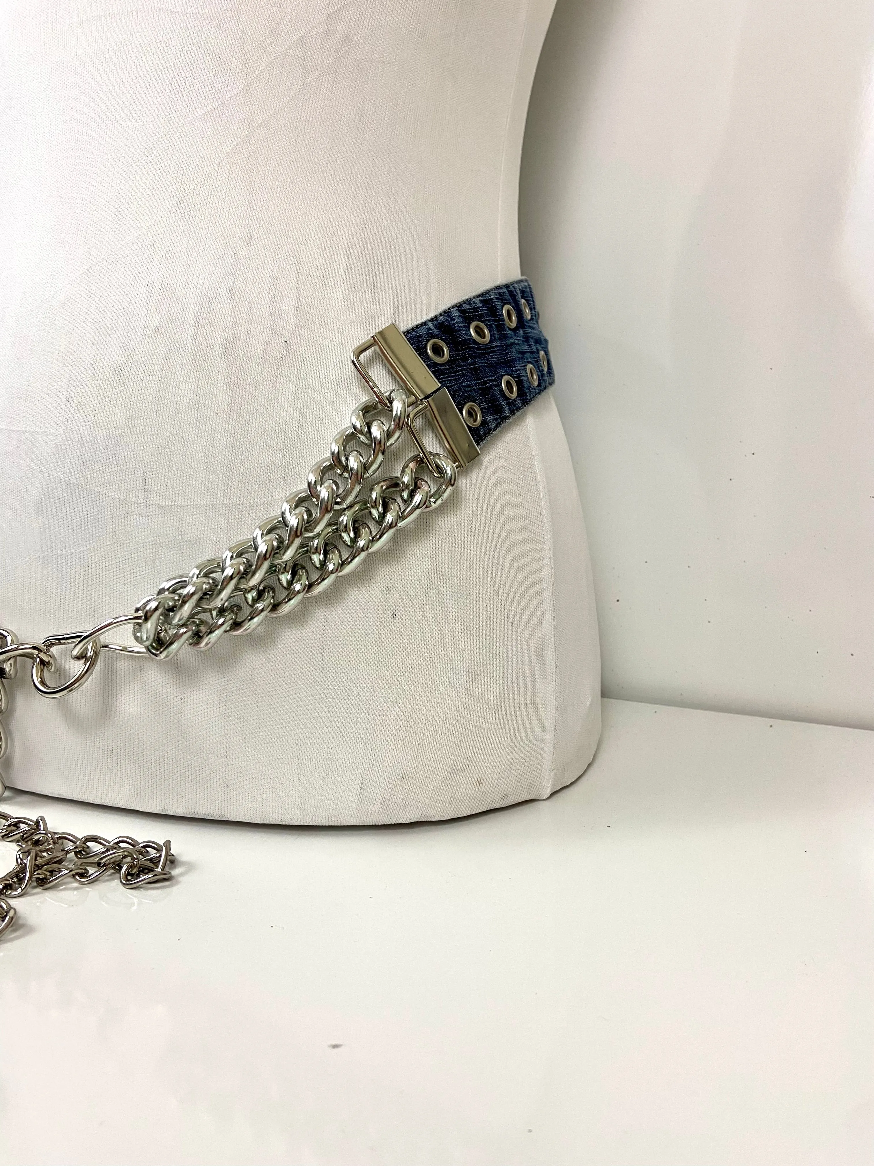 Reworked denim and chain belt