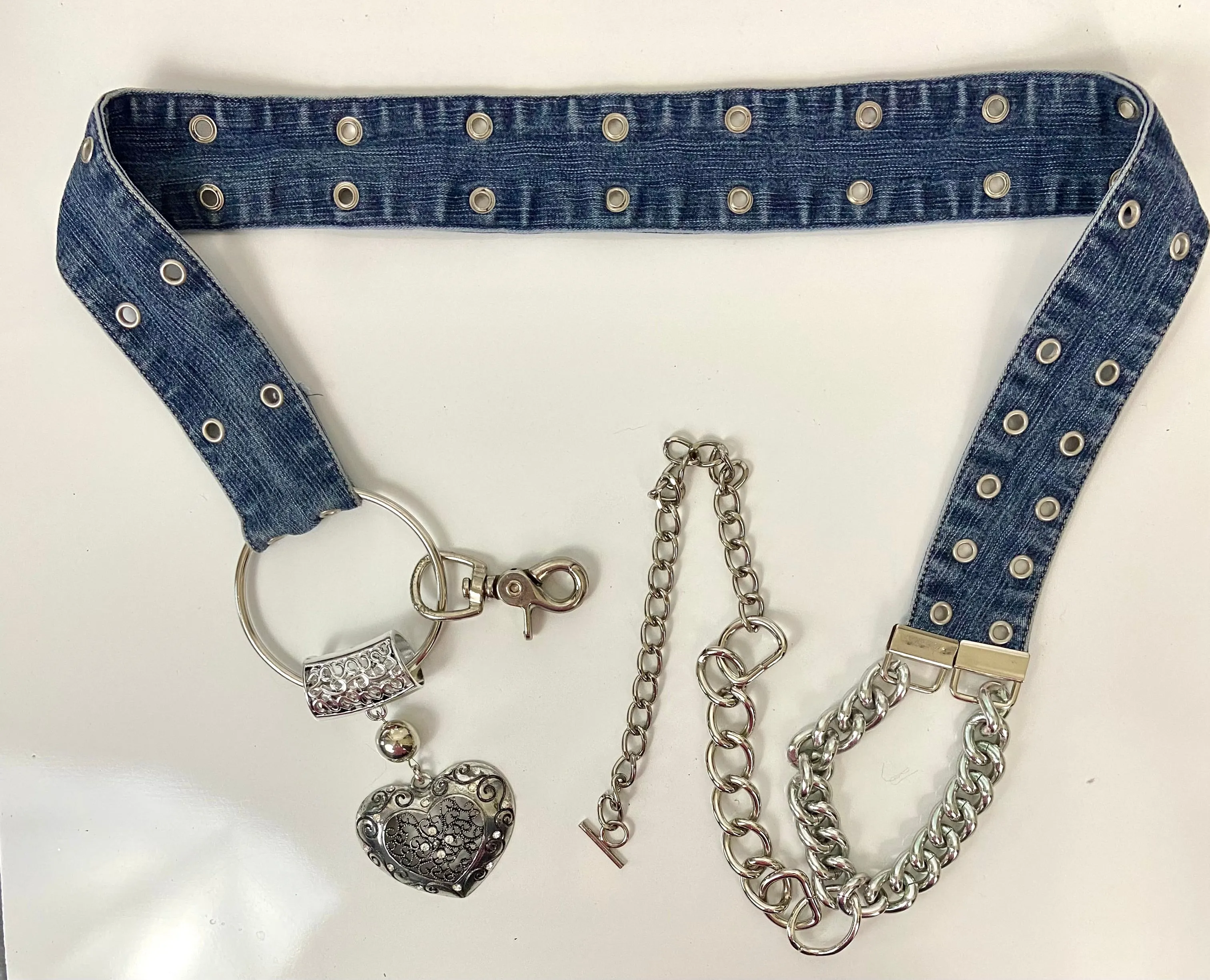 Reworked denim and chain belt