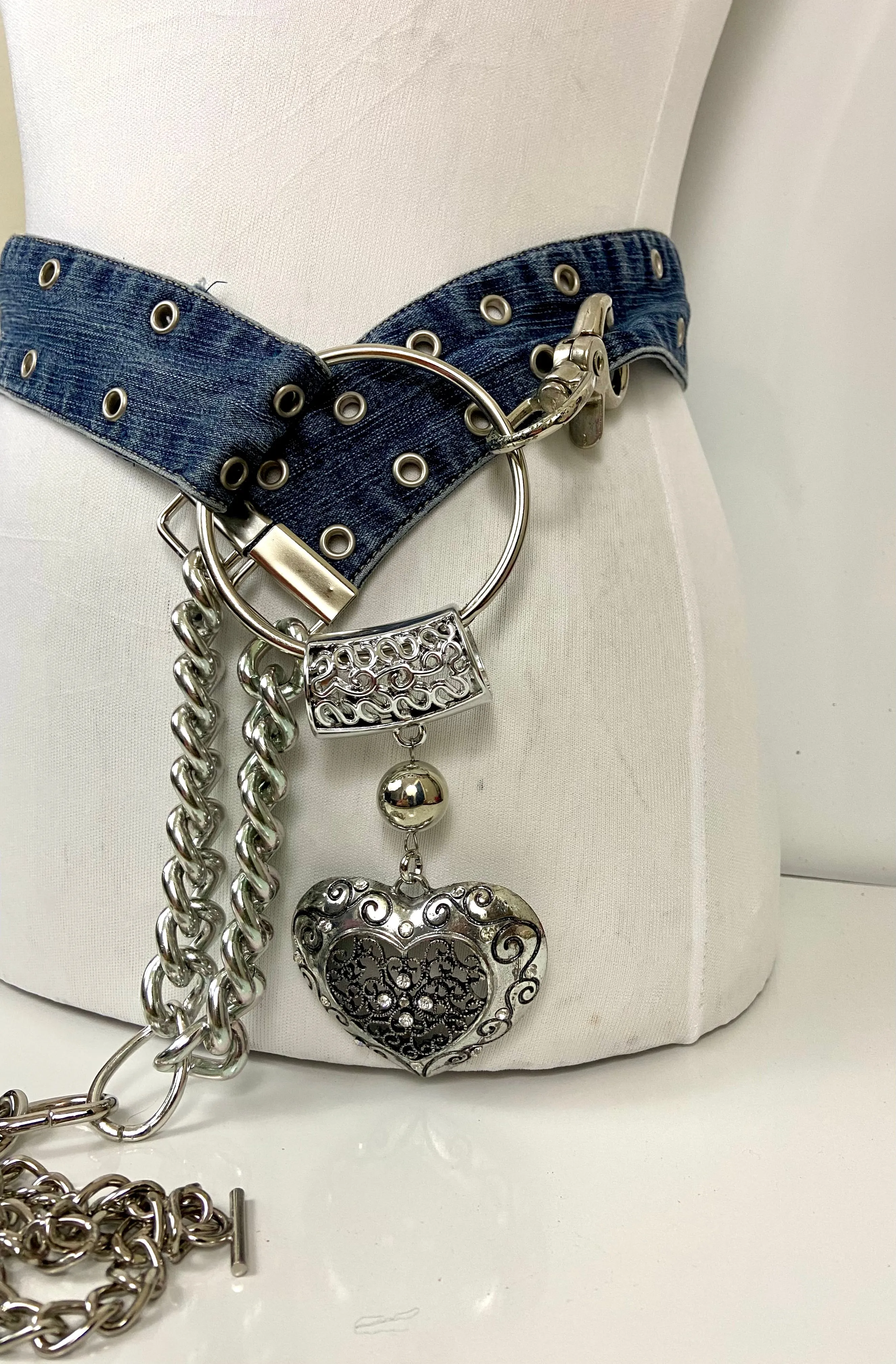 Reworked denim and chain belt